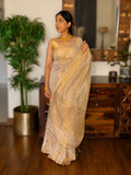 White and gold tissue saree with elegant drape by TIULIP