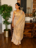 White and gold tissue saree with elegant drape by TIULIP