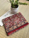 Charulekha hand printed red cotton Kalamkari saree with traditional artistic motifs in soft breathable cotton for office wear, festive occasions, and everyday elegance