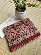 Charulekha hand printed red cotton Kalamkari saree with traditional artistic motifs in soft breathable cotton for office wear, festive occasions, and everyday elegance