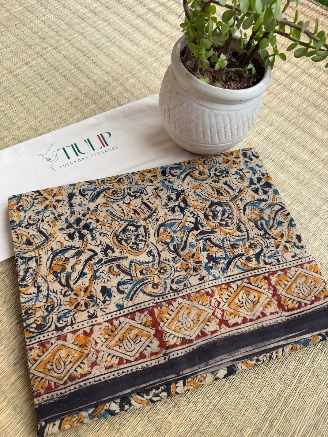 Svarnarekha hand printed yellow cotton Kalamkari saree with intricate traditional motifs in soft breathable cotton for festive occasions, office wear, and everyday elegance