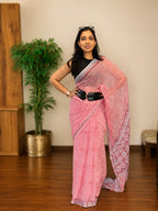 Rosé Petal pink chiffon saree by Tulip Saree, draped gracefully showing lightweight fabric and blush pink colour