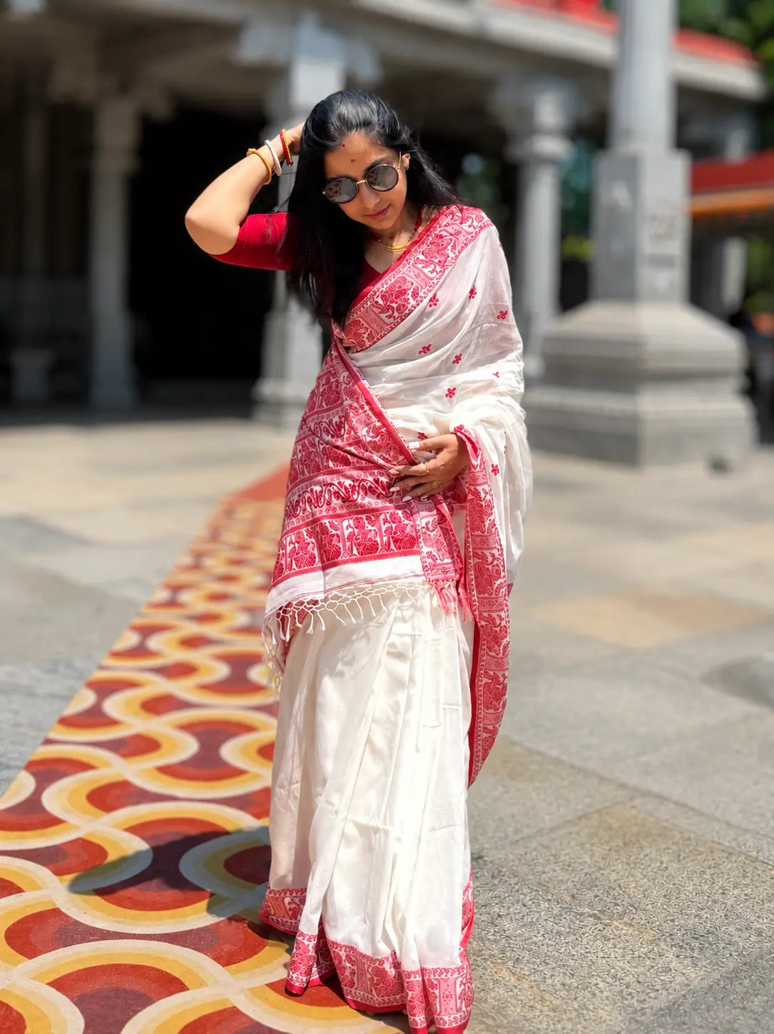 Handwoven cotton Jamdani saree in white and red with traditional motifs