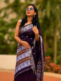 Handwoven cotton Jamdani saree in purple and silver with traditional motifs