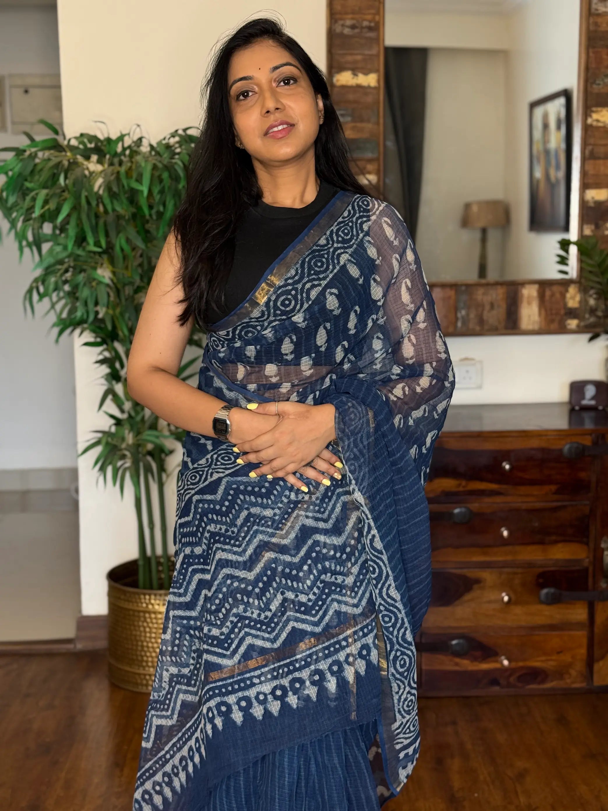 Blue handwoven Kota Doria saree with elegant woven motifs