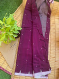 Purple handwoven cotton Jamdani saree with traditional woven patterns
