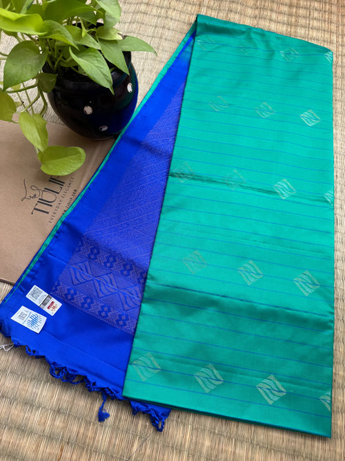 Blue and Green Coimbatore soft silk saree featuring elegant woven motifs