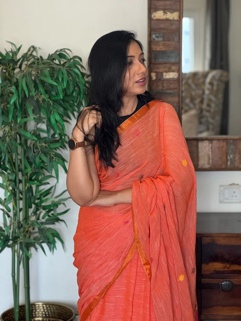 Aarohi pure linen orange saree in soft breathable fabric for office wear, festive mornings, and everyday elegance