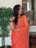 Aarohi pure linen orange saree in soft breathable fabric for office wear, festive mornings, and everyday elegance