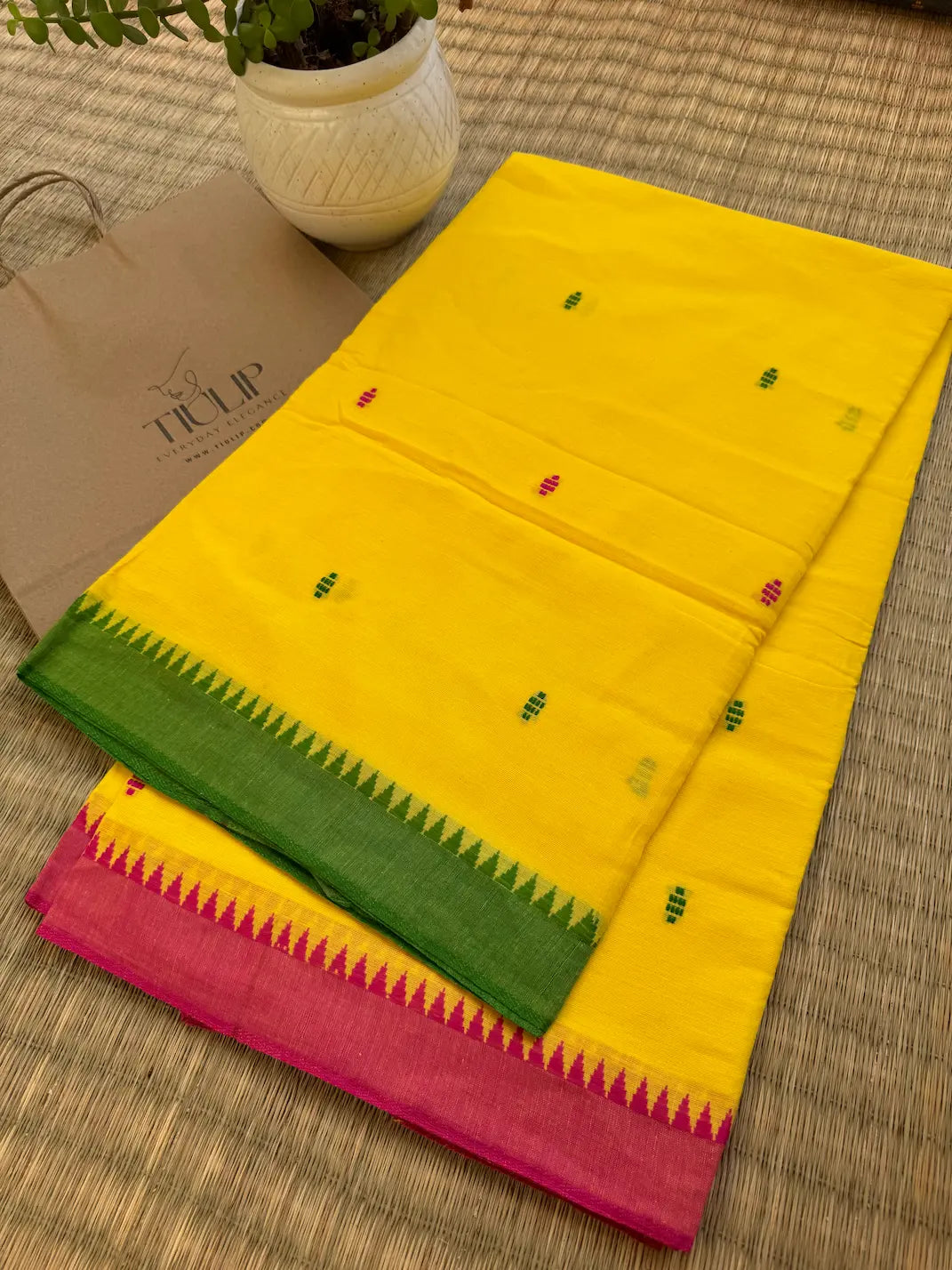 Piyali pure handwoven yellow Dhaniakhali cotton saree with red and green borders in soft breathable cotton for office wear, festive mornings, and everyday elegance