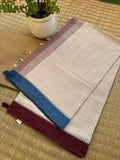 Aloka pure handwoven white Dhaniakhali cotton saree with red and blue vertical stripes in soft breathable cotton for office wear and everyday elegance